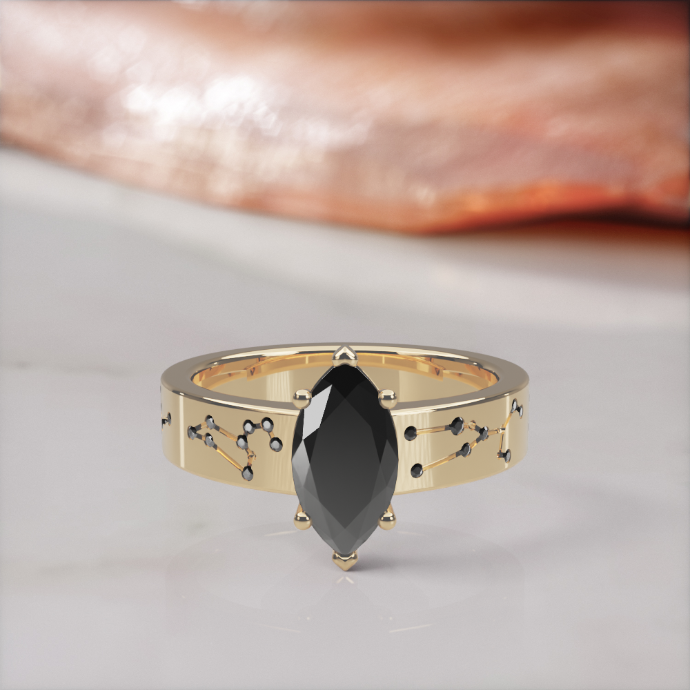 Constellation engagement ring in yellow gold with a natural black marquise diamond and black constellation diamonds, front view lying flat