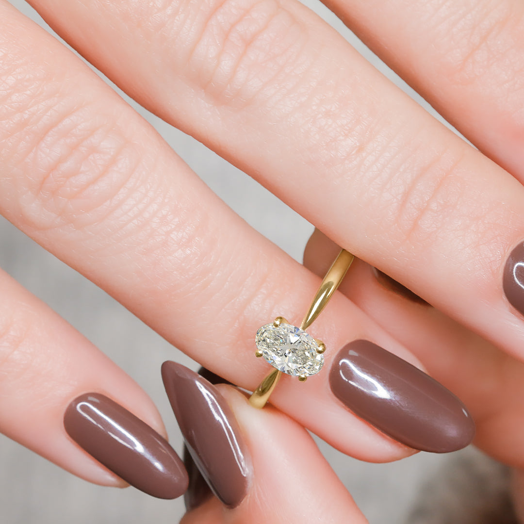 Descending Natural Oval Diamond Engagement Ring