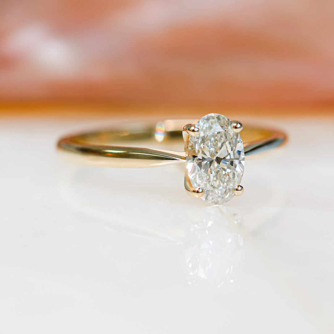 Descending Natural Oval Diamond Engagement Ring