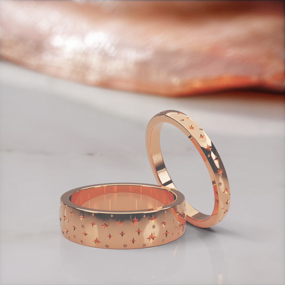 Starz wedding bands in rose gold, the 5 mm and 2 mm engraved star bands as a pair