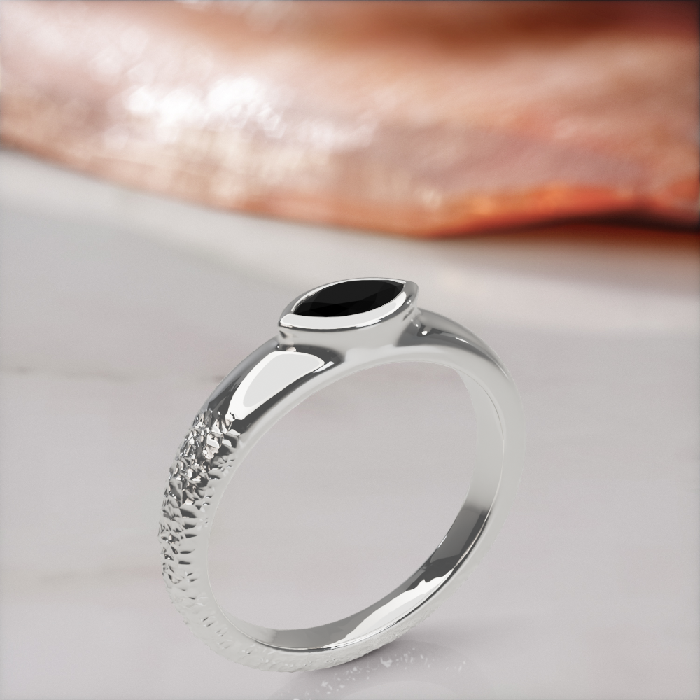 Disturbed engagement ring in white gold standing upright, three-quarter view of the rough and polished halves of the band