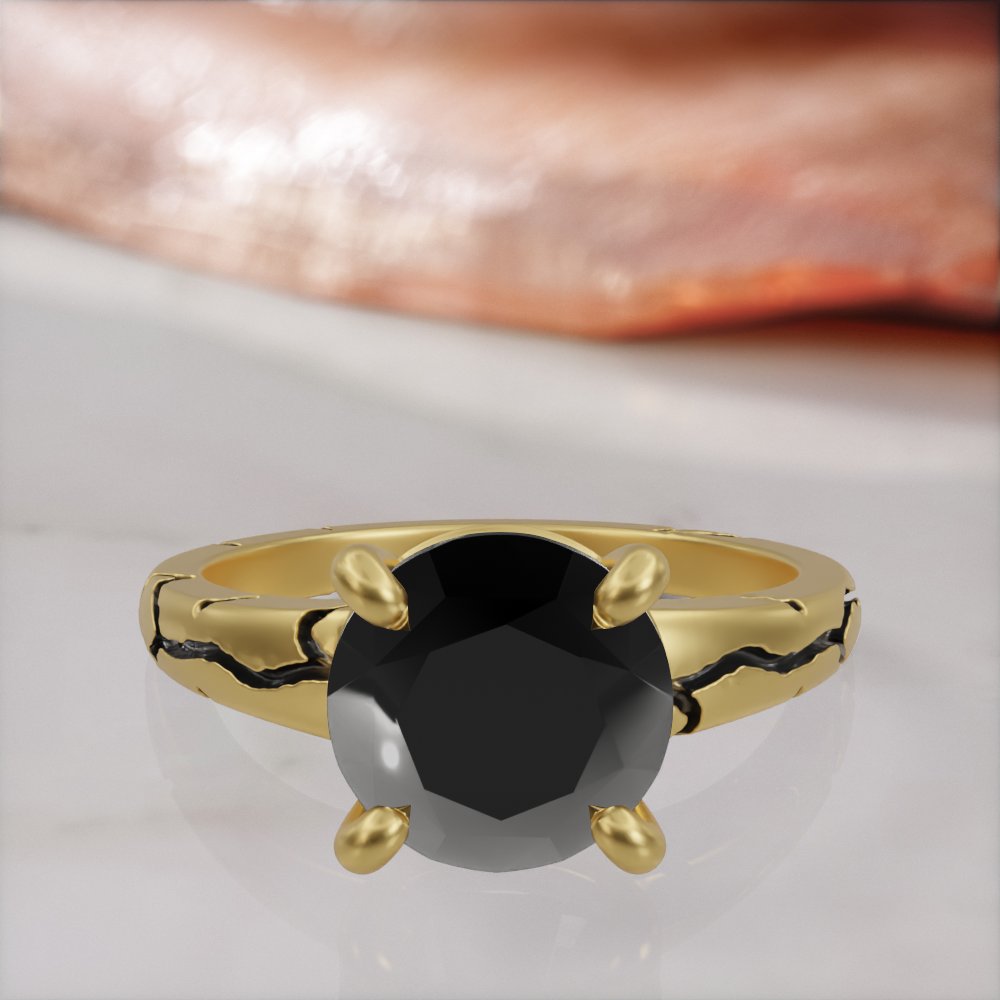 Kintsugi engagement ring in yellow gold, front view of the black diamond